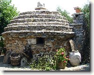 Koumos - Stavba m�stn�ho Gaud�ho