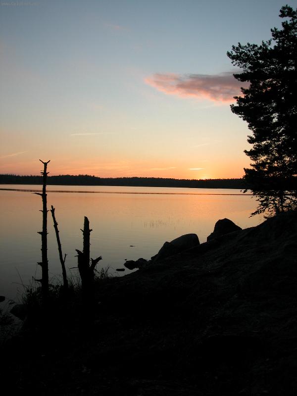 Foto: z�pad slunce nad jezerem