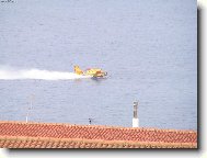 nabrat vodu a honem zp�tky nad ho��c� les