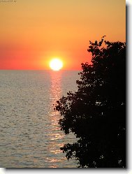 z�pad slunce nad hladinou