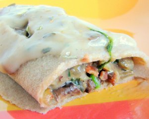 Recept online: Zape�en� pala�inky se �pen�tem, slaninou a �ampiony: Pala�inky pln�n� oko�en�nou sm�s� �pen�tu, �ampion� a osma�en� slaniny, zape�en�